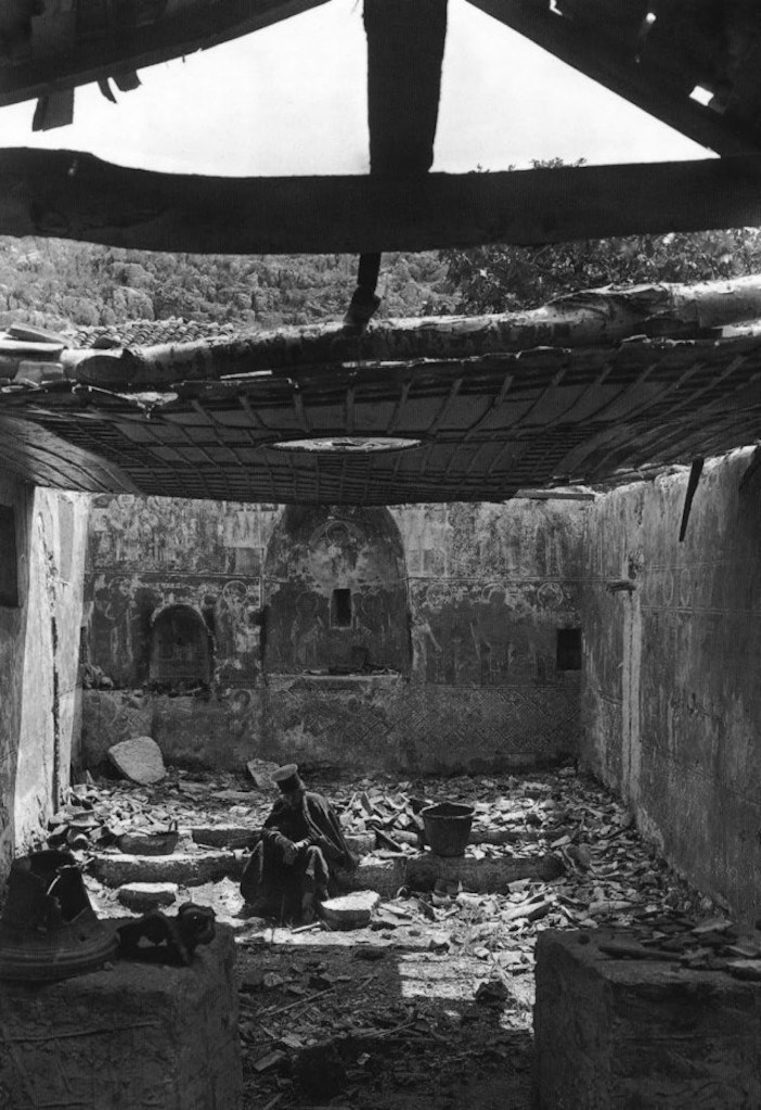 A priest in a destroyed church in Kastri, Preveza,